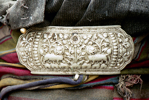 Traditional Tibetan silver buckle, with animal and floral motifs, Tibet 1996